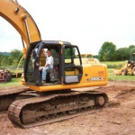 John Sinopoli on excavator performing remediation work at private residence.